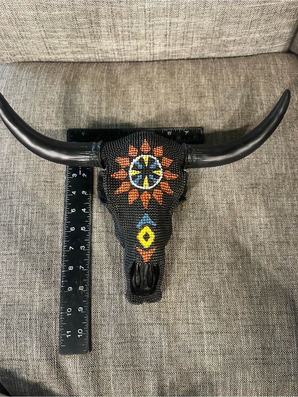 Handcrafted Black Beaded Bull Skull Wall Accent with Colorful Geometric Design